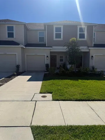 a house view with a garden space