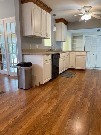 45 Harvard Road Shirley, MA 01464 - Photo 11 of 37 a kitchen with a cabinets and wooden floor