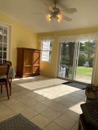 45 Harvard Road Shirley, MA 01464 - Photo 14 of 37 a view of a livingroom with furniture wooden floor and a rug
