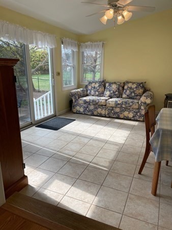 45 Harvard Road Shirley, MA 01464 - Photo 16 of 37 a large bedroom with a bed and a table
