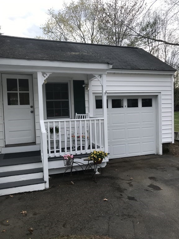 45 Harvard Road Shirley, MA 01464 - Photo 2 of 37 a front view of a house with stairs
