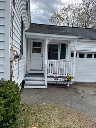 45 Harvard Road Shirley, MA 01464 - Photo 31 of 37 a view of a house with a large window and wooden fence