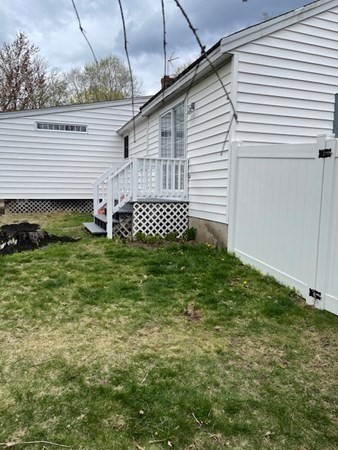 45 Harvard Road Shirley, MA 01464 - Photo 32 of 37 a front view of a house with a garden