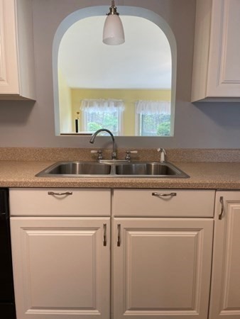 45 Harvard Road Shirley, MA 01464 - Photo 8 of 37 a kitchen with a sink and cabinets
