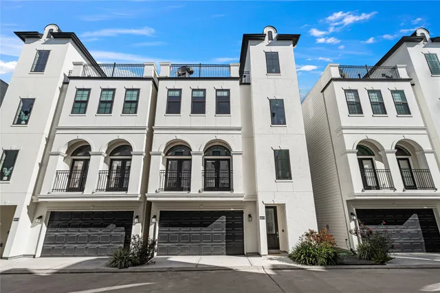 a front view of a building with a lot of windows