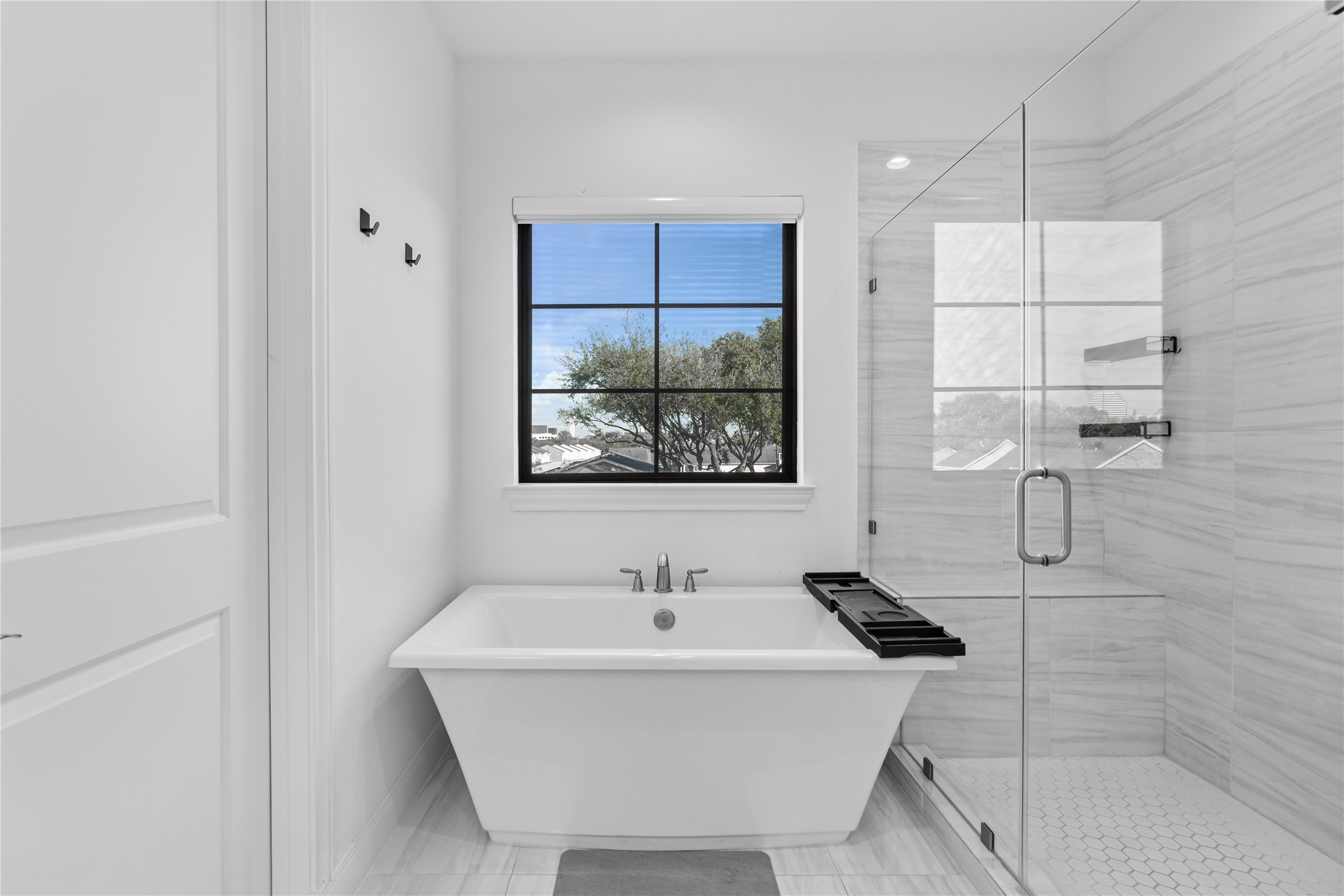 3319 Beverly Forest Drive Houston, TX 77057 - Photo 23 of 32 a bathroom with a bathtub and shower