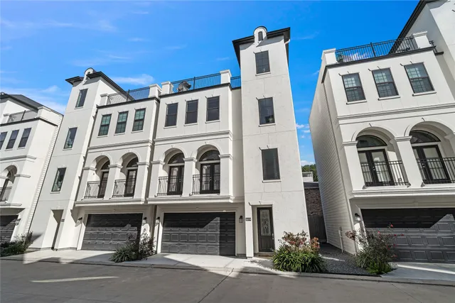 a front view of a multi story residential apartment building