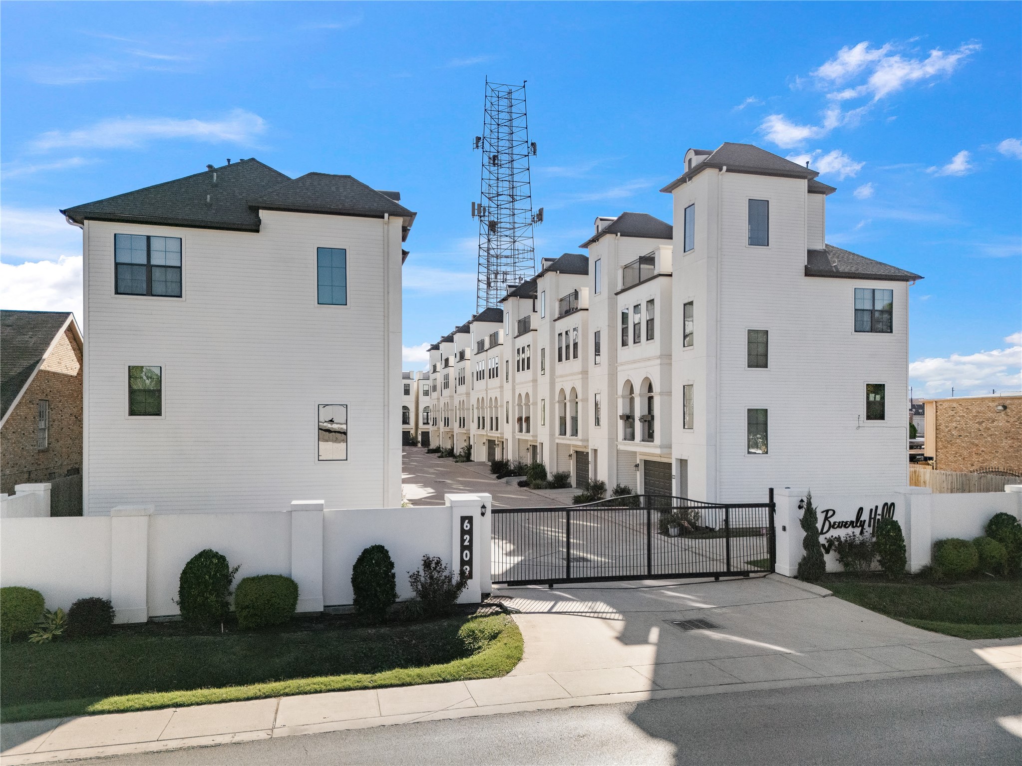 3319 Beverly Forest Drive Houston, TX 77057 - Photo 31 of 32 a large building with a clock on the wall