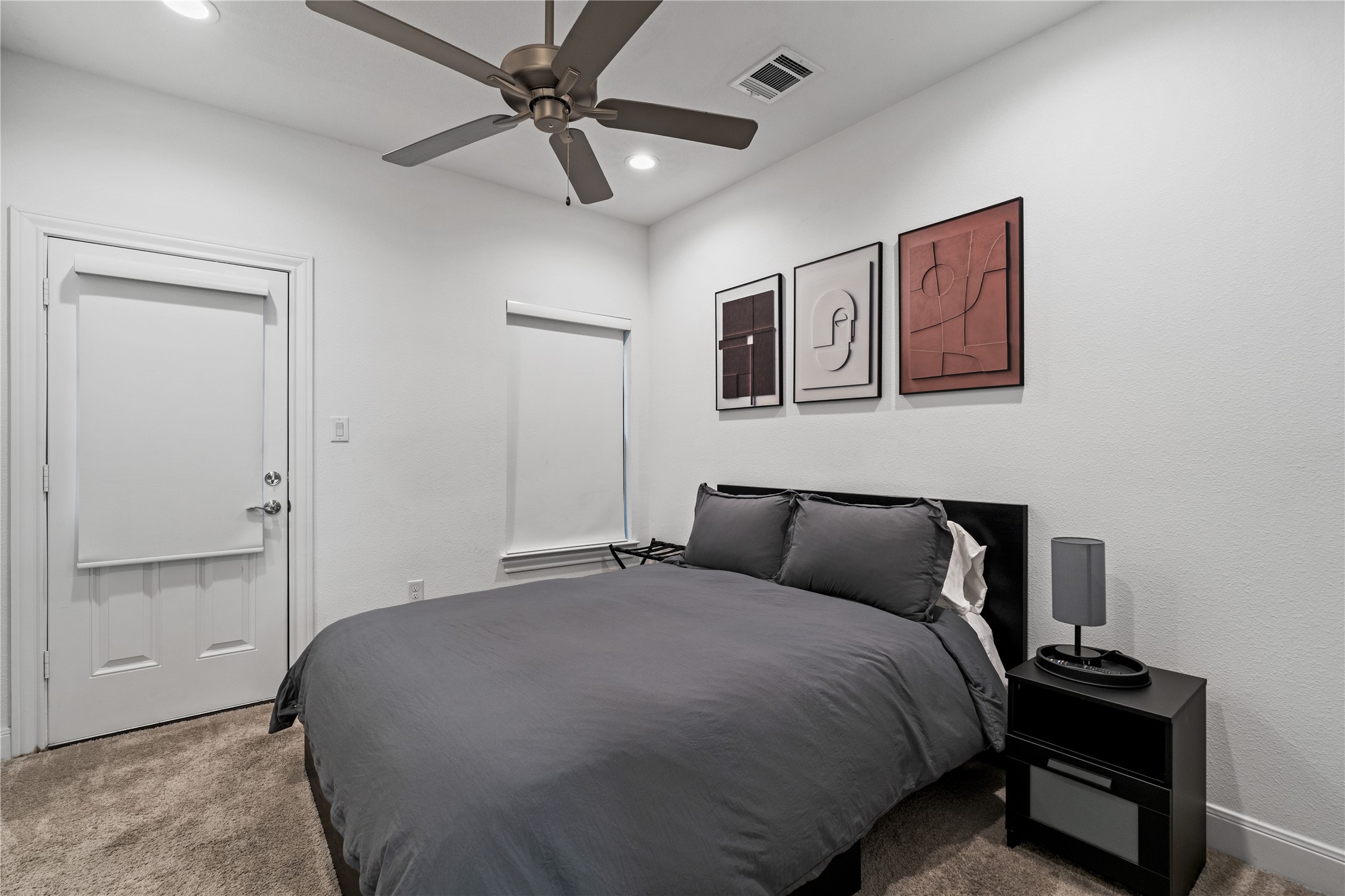 3319 Beverly Forest Drive Houston, TX 77057 - Photo 6 of 32 a bedroom with a bed and a chandelier