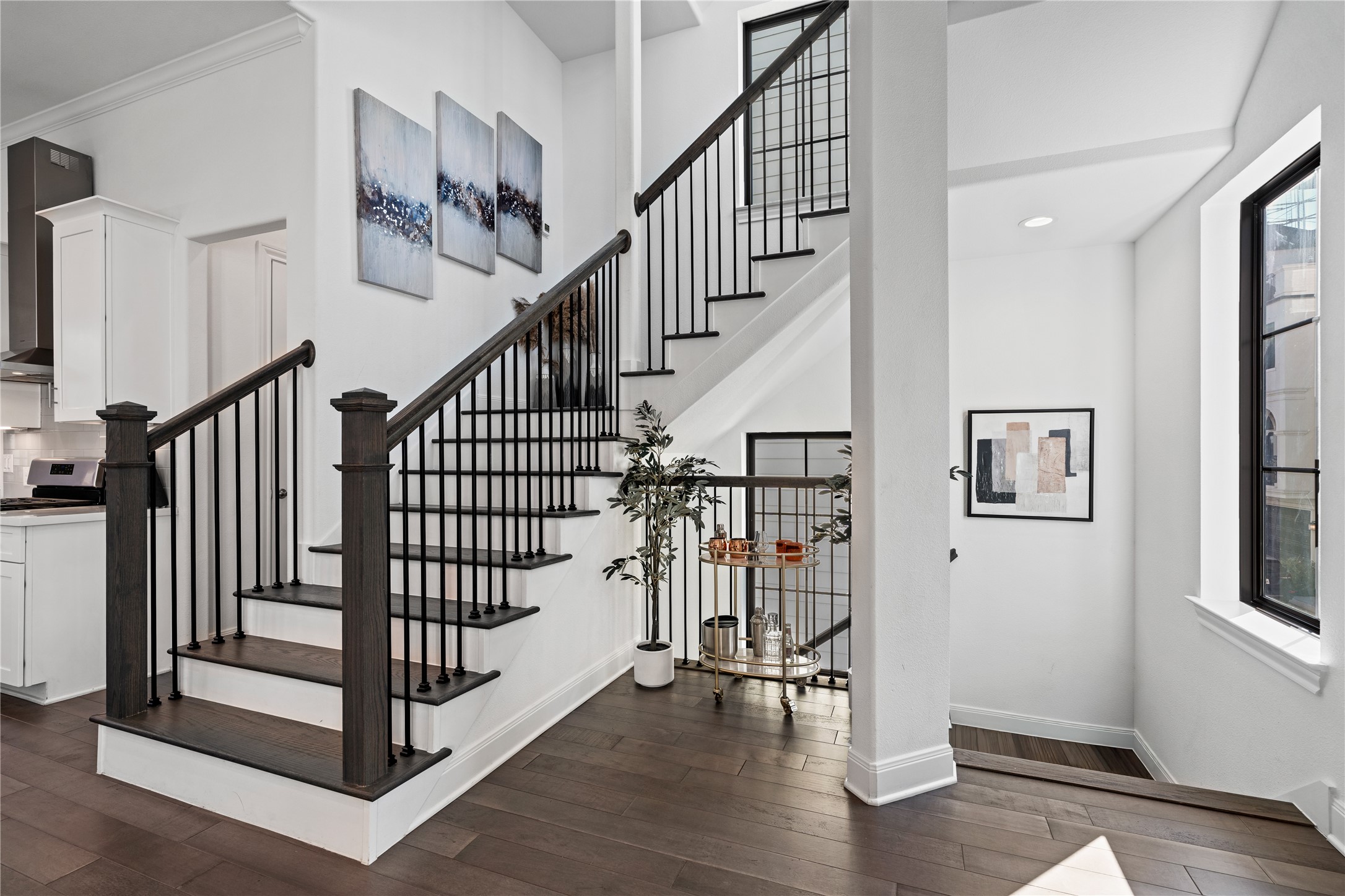 3319 Beverly Forest Drive Houston, TX 77057 - Photo 8 of 32 a view of entryway with stairs and wooden floor