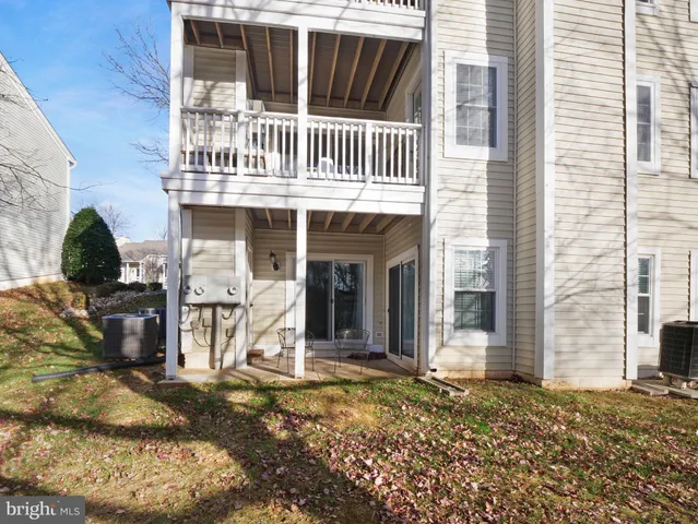 a white refrigerator freezer sitting inside of a kitchen