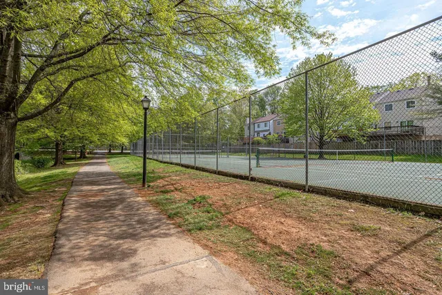 a view of a pathway with a building in the background