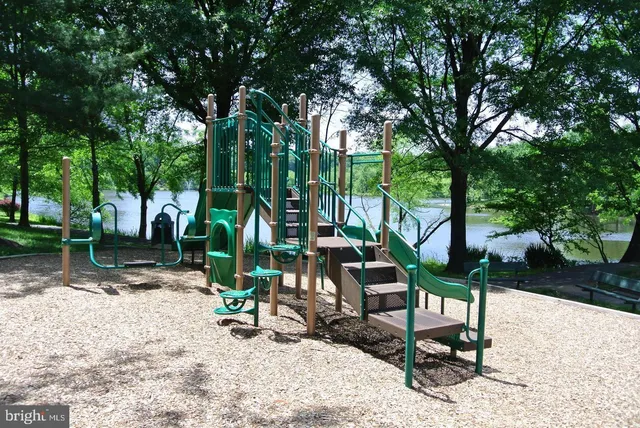 a view of a building with sitting area