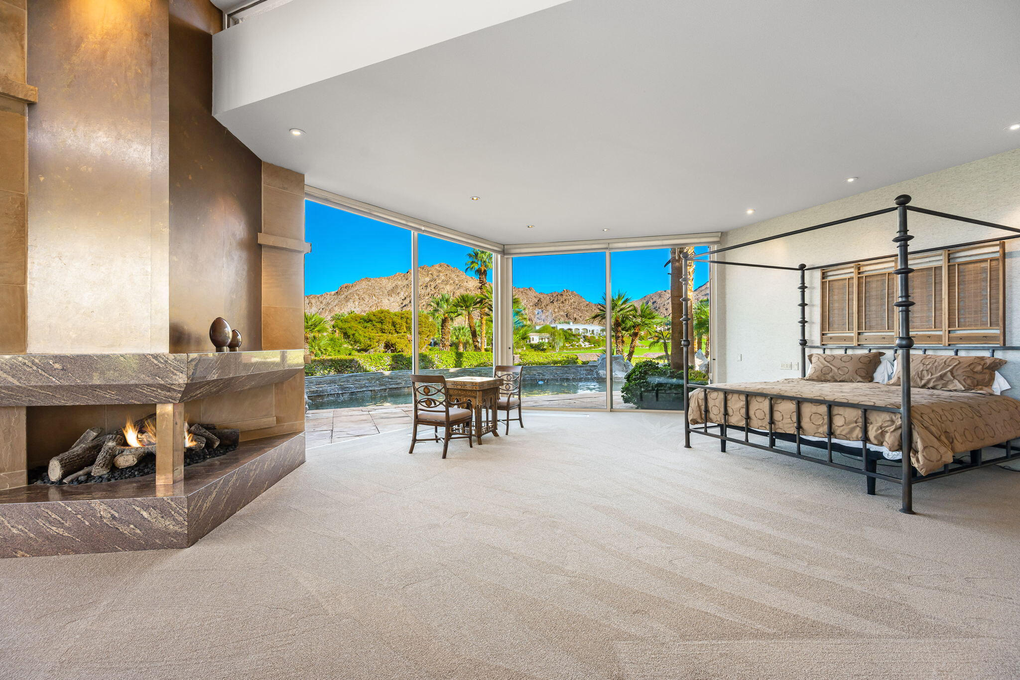 47725 Vintage Drive East Indian Wells, CA 92210 - Photo 6 of 10 a bedroom with furniture and a large window