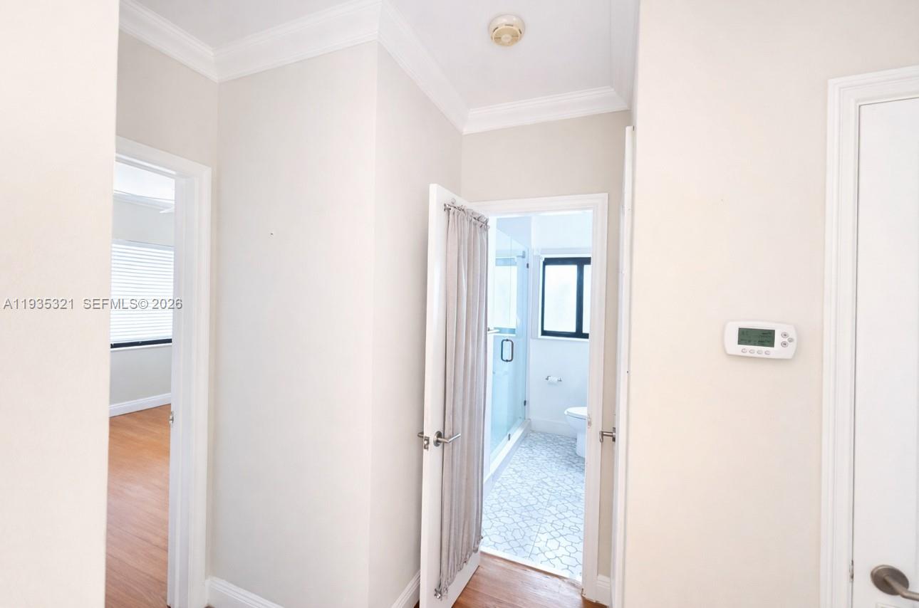 1780 Southwest 21st Street Miami, FL 33145 - Photo 13 of 17 a view of a bathroom from a hallway