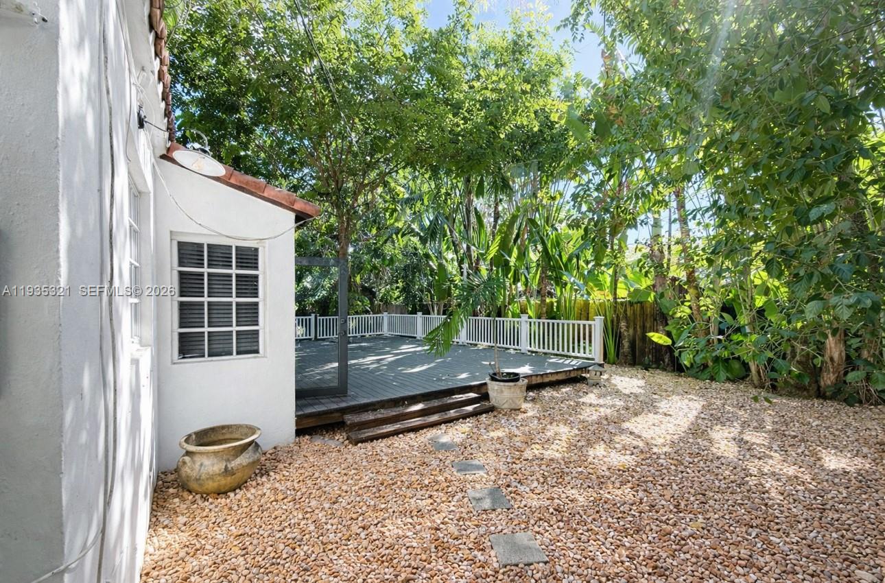 1780 Southwest 21st Street Miami, FL 33145 - Photo 14 of 17 a backyard of a house with lots of green space