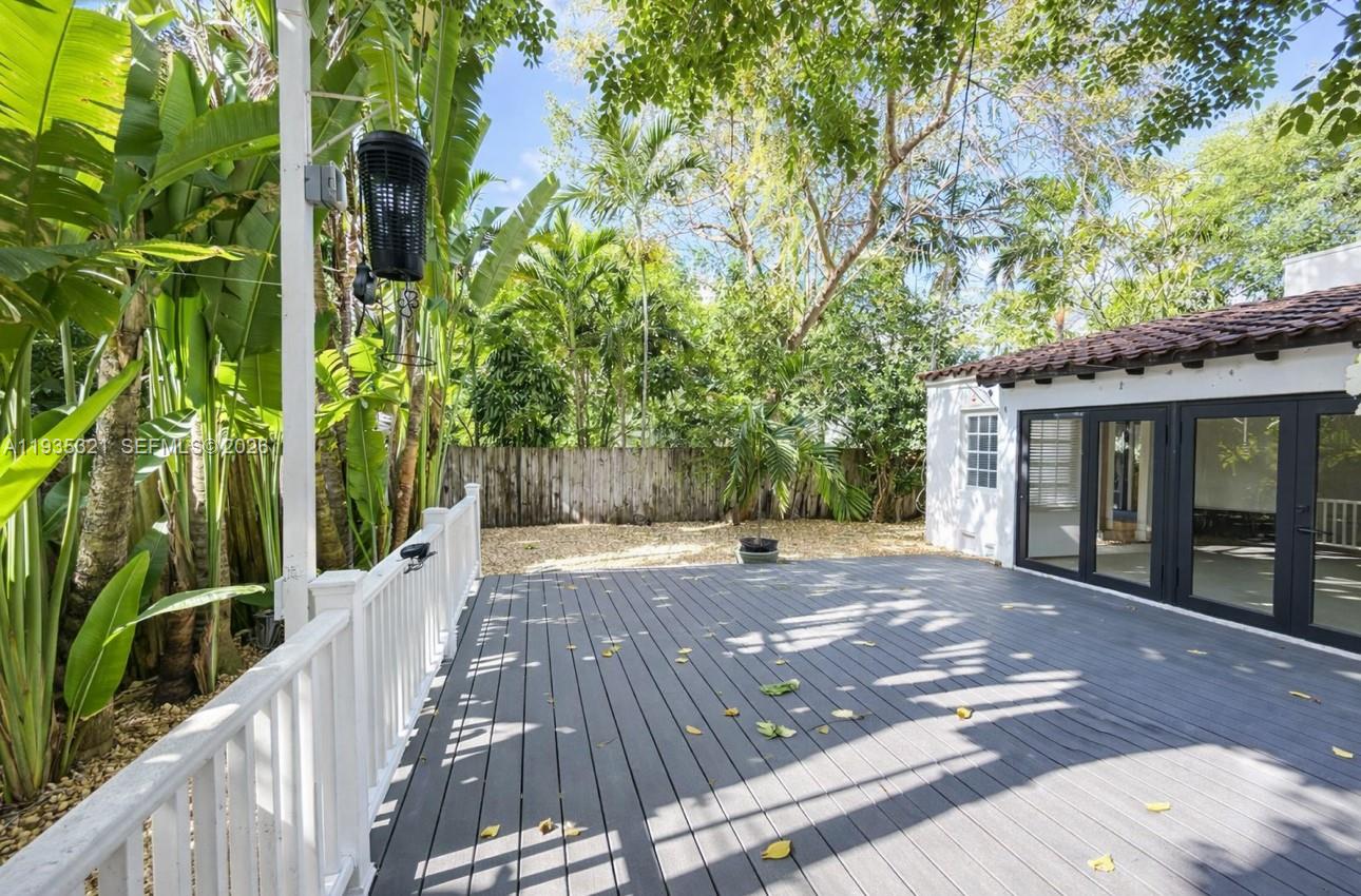 1780 Southwest 21st Street Miami, FL 33145 - Photo 16 of 17 a view of a house with backyard and garden