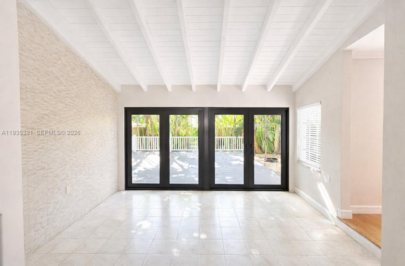 1780 Southwest 21st Street Miami, FL 33145 - Photo 3 of 17 a view of an empty room with a window