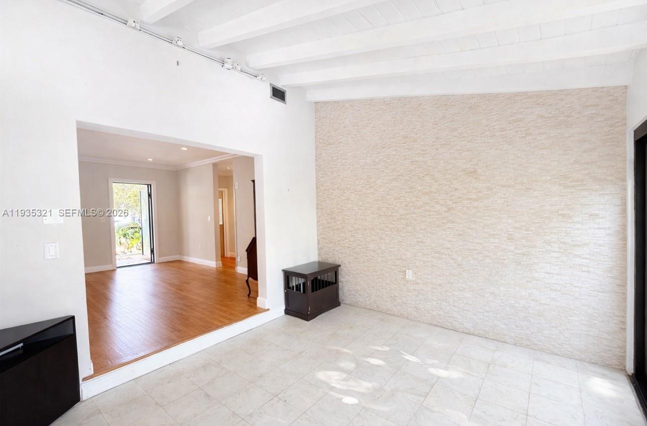 1780 Southwest 21st Street Miami, FL 33145 - Photo 4 of 17 a view of livingroom with hardwood floor and a ceiling fan