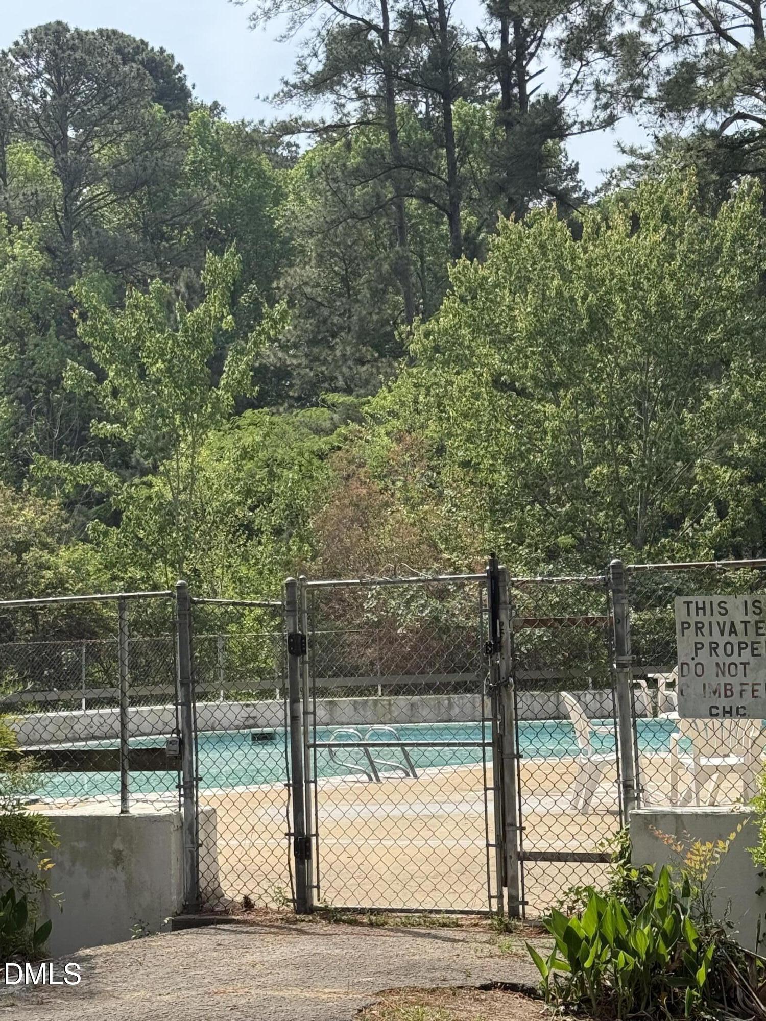 546 Pine Ridge Place Raleigh, NC 27609 - Photo 25 of 28 a view of a yard from a balcony