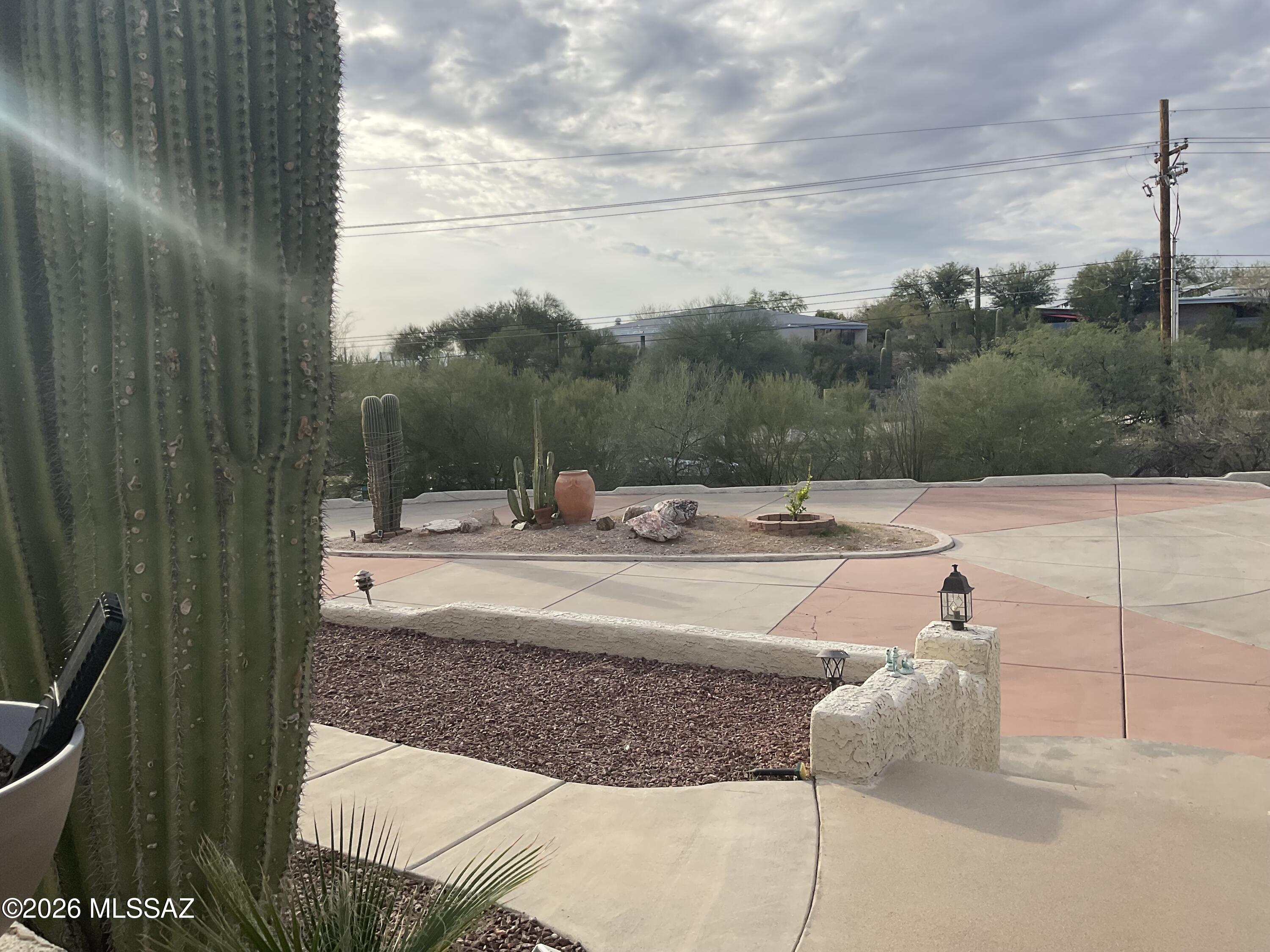 4060 North Swan Road Tucson, AZ 85718 - Photo 5 of 47 a view of a swimming pool with a yard