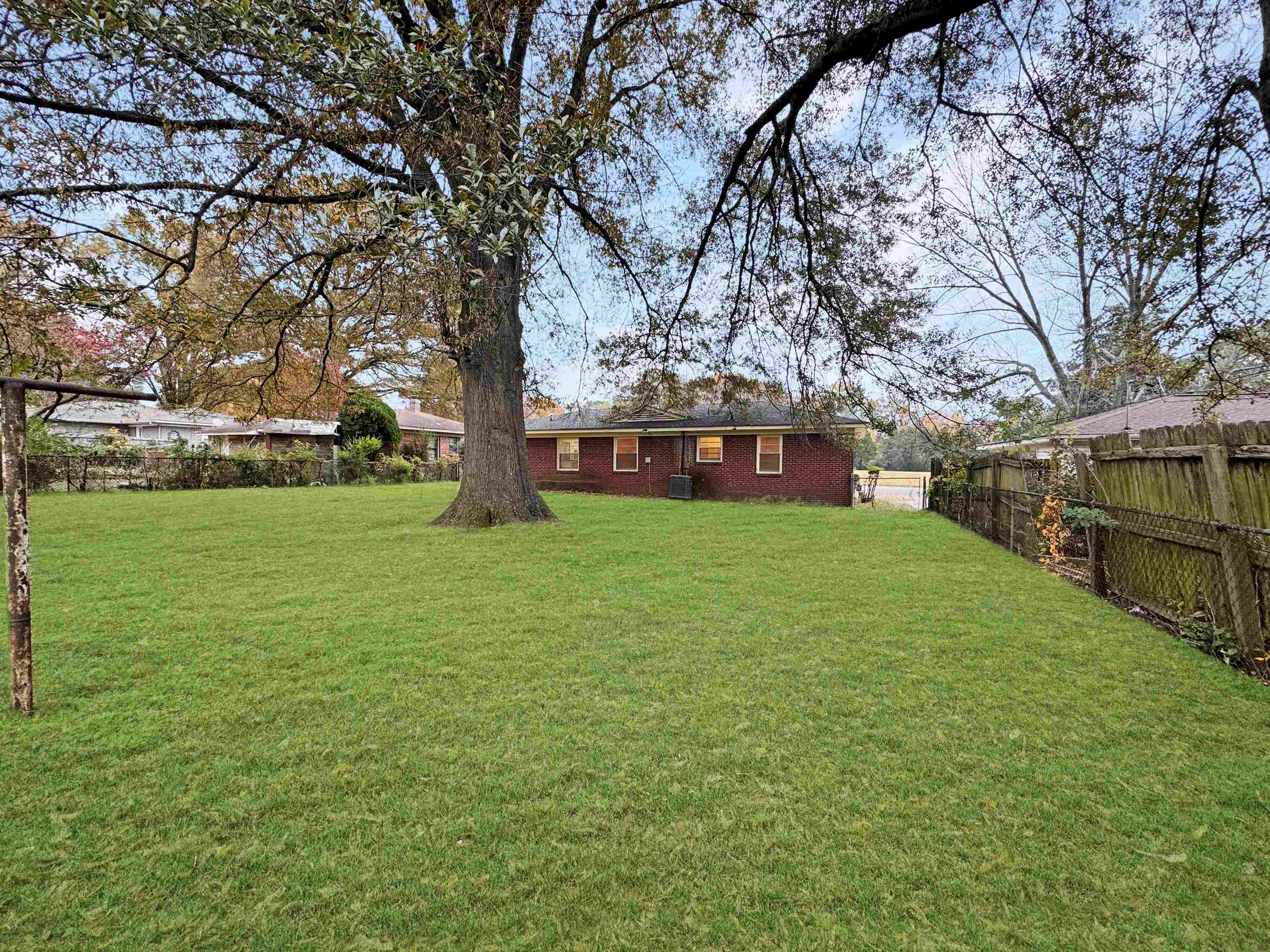 1519 South White Station Road Memphis, TN 38117 - Photo 16 of 31 a view of a house with a yard