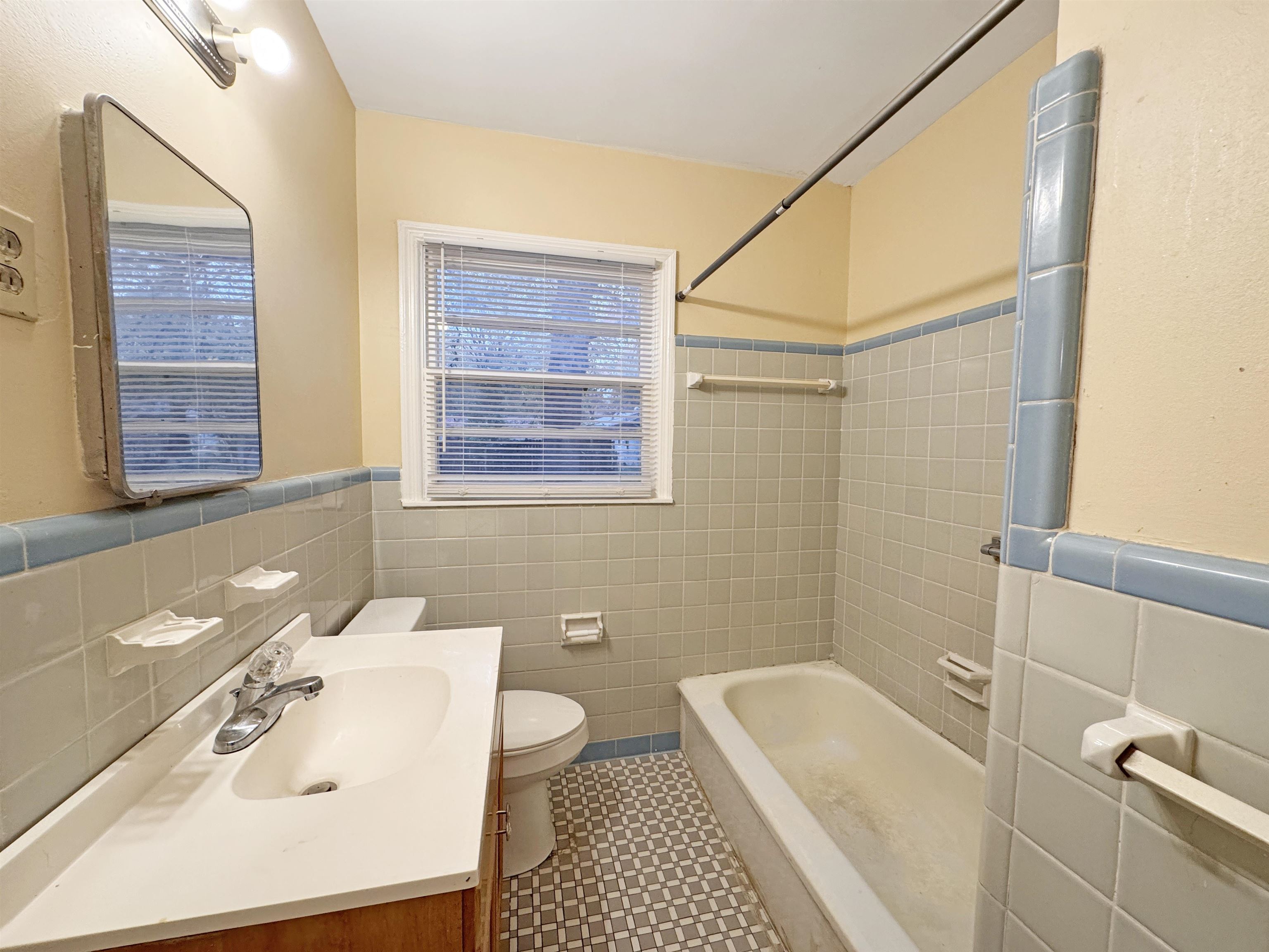 1519 South White Station Road Memphis, TN 38117 - Photo 31 of 31 a bathroom with a sink a toilet and shower