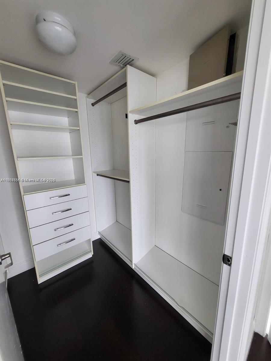 485 Brickell Avenue, Unit 4103 Miami, FL 33131 - Photo 11 of 13 a view of walk in closet