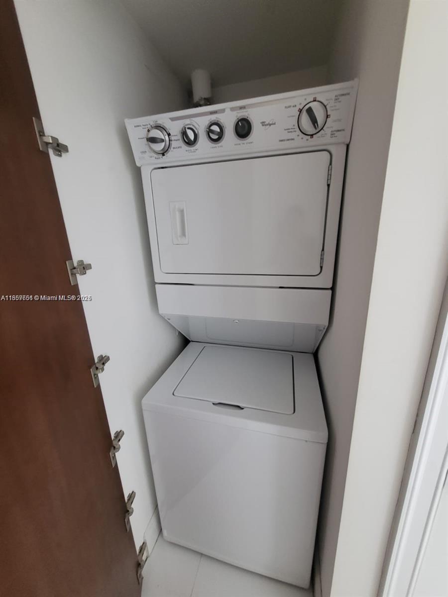 485 Brickell Avenue, Unit 4103 Miami, FL 33131 - Photo 13 of 13 a close up view of washer and dryer