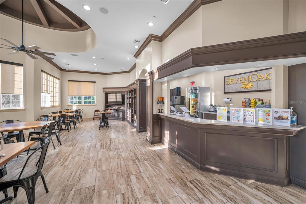 3619 Hatchbend Way Wesley Chapel, FL 33544 - Photo 73 of 86 a kitchen with lots of counter top space and wooden floor