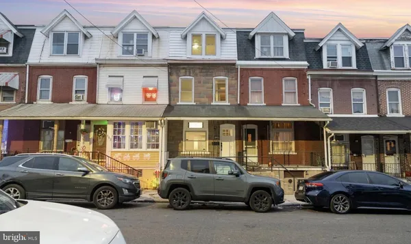 a car parked in front of a building