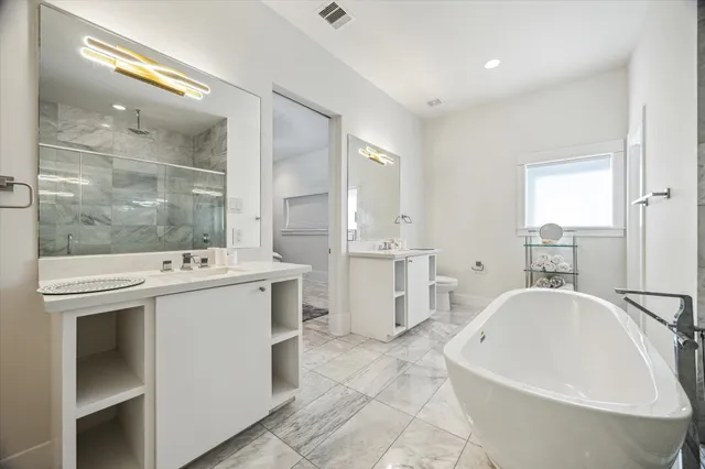 a view of a hall with wooden floor