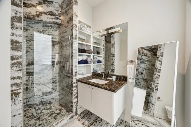 a room with furniture cabinets and a window