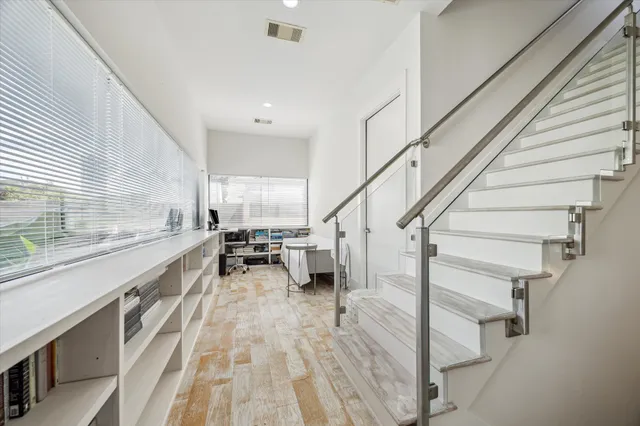 a living room with a couch and a flat screen tv