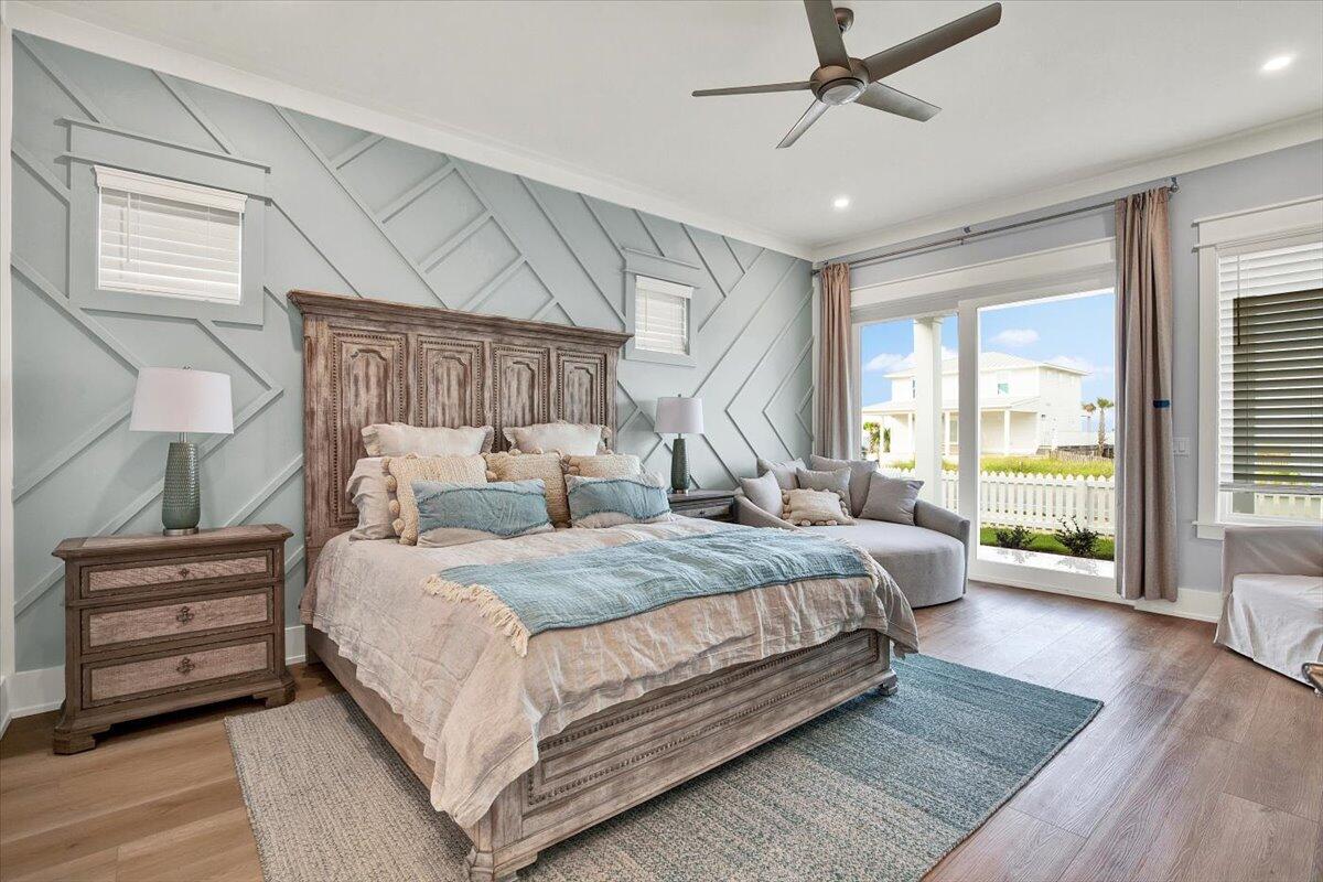 16418 Front Beach Road Panama City Beach, FL 32413 - Photo 11 of 40 a bedroom with a large bed and a large window
