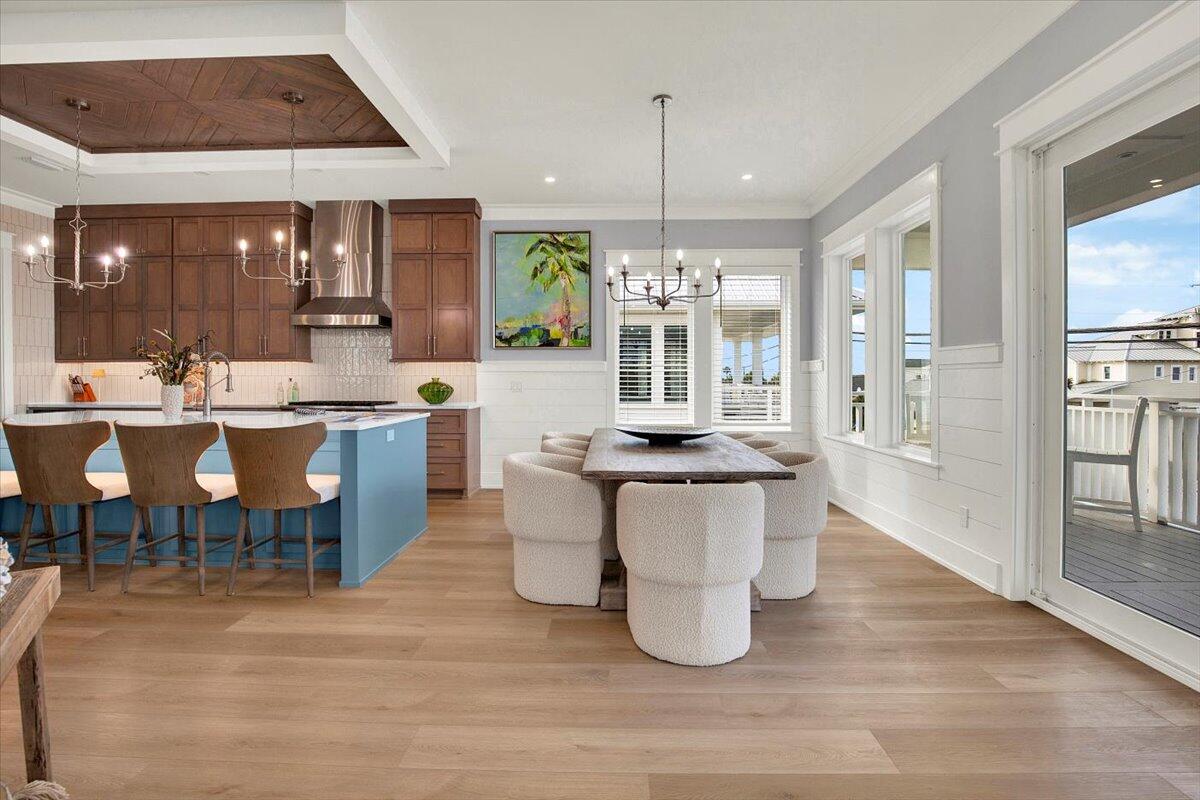 16418 Front Beach Road Panama City Beach, FL 32413 - Photo 24 of 40 a large kitchen with a table and chairs