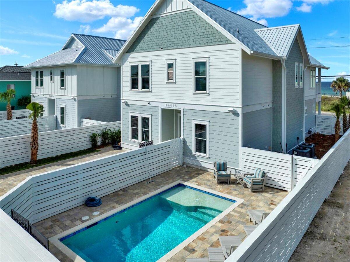 16418 Front Beach Road Panama City Beach, FL 32413 - Photo 3 of 40 a view of a house with pool