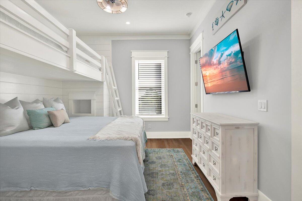 16418 Front Beach Road Panama City Beach, FL 32413 - Photo 36 of 40 a bedroom with a bed and a painting on the wall