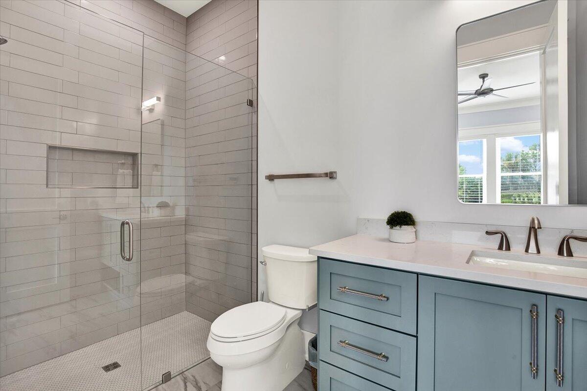 16418 Front Beach Road Panama City Beach, FL 32413 - Photo 7 of 40 a bathroom with a sink a toilet and shower