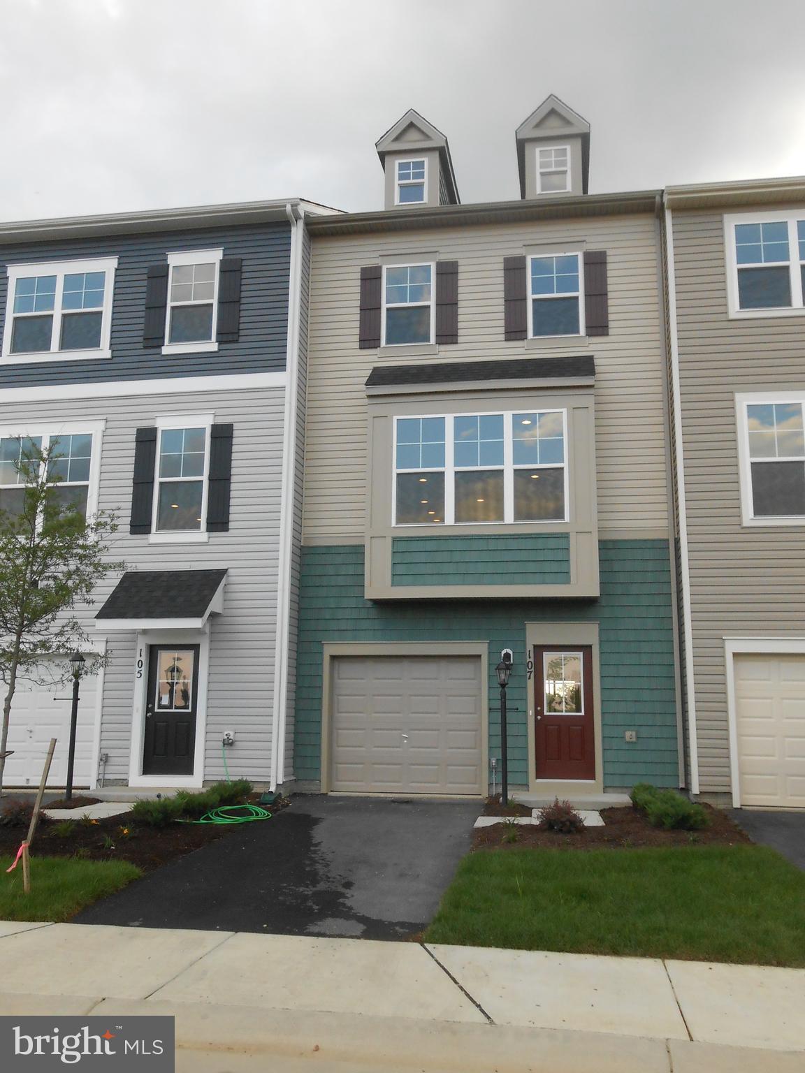 a front view of residential houses