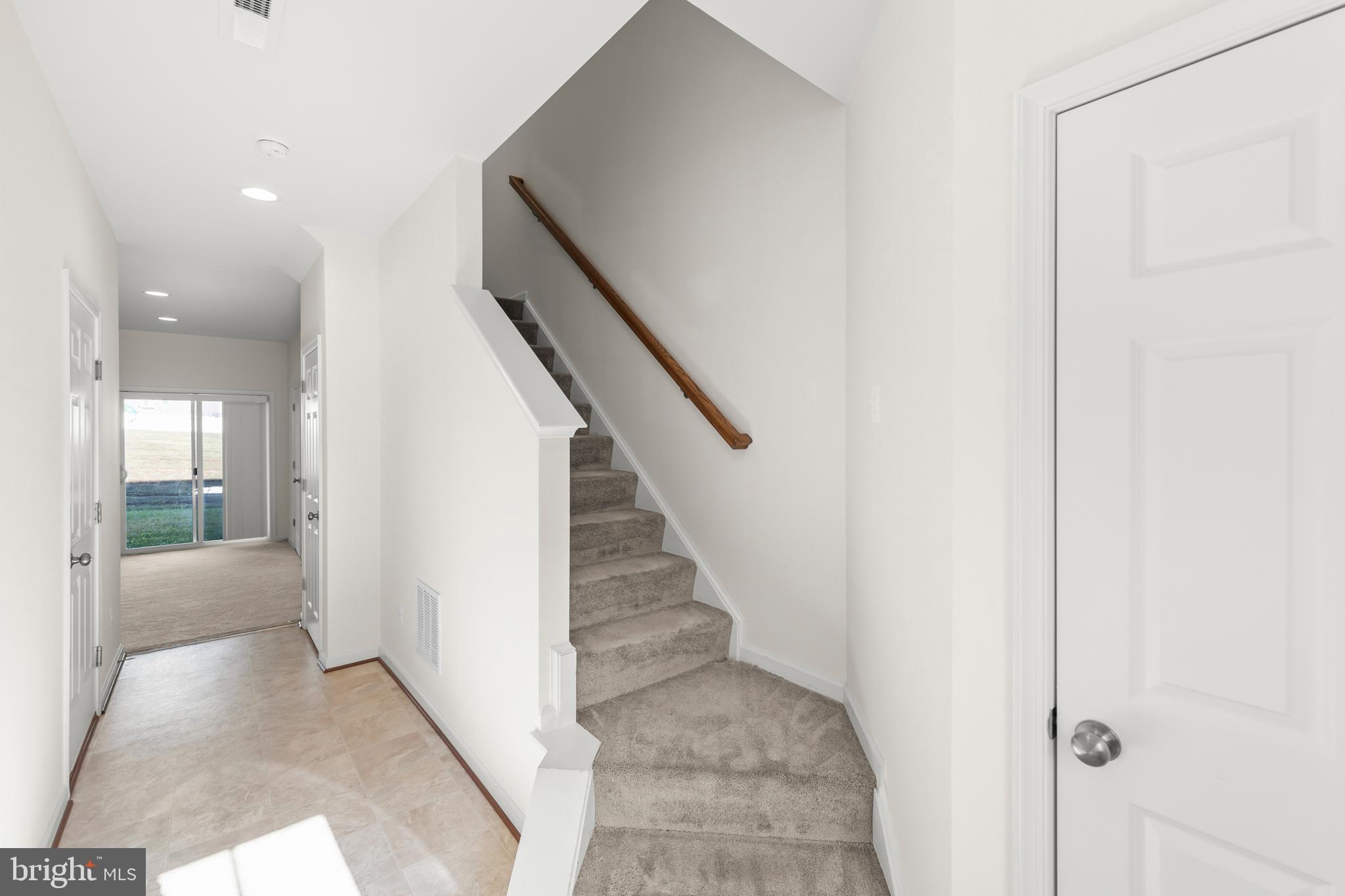 107 Fading Star Court Stephenson, VA 22656 - Photo 16 of 50 a view of a hallway with staircase