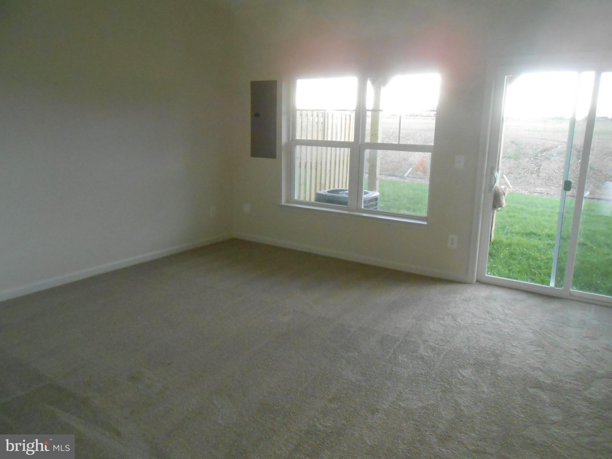 107 Fading Star Court Stephenson, VA 22656 - Photo 2 of 50 an empty room with windows