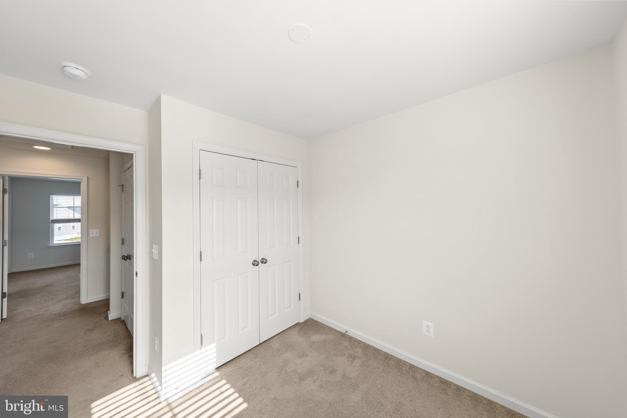 107 Fading Star Court Stephenson, VA 22656 - Photo 39 of 50 a view of a room with wooden floor and closet