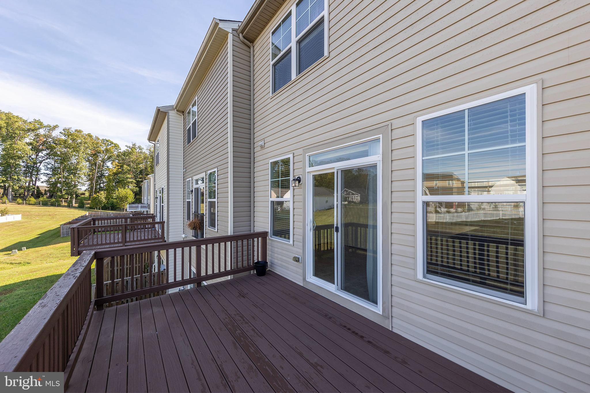 107 Fading Star Court Stephenson, VA 22656 - Photo 45 of 50 a view of balcony with wooden floor and seating space