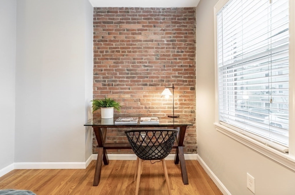 353 Sumner Street, Unit 1 Boston, MA 02128 - Photo 14 of 23 a dining room with furniture and a window