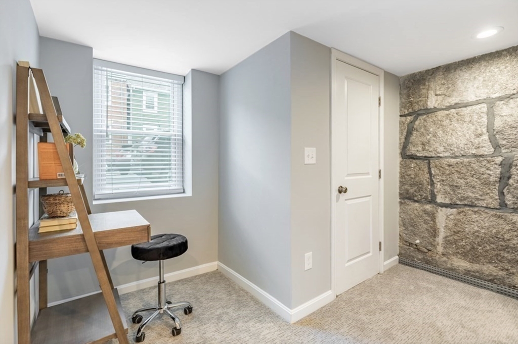 353 Sumner Street, Unit 1 Boston, MA 02128 - Photo 19 of 23 a view of workspace with windows