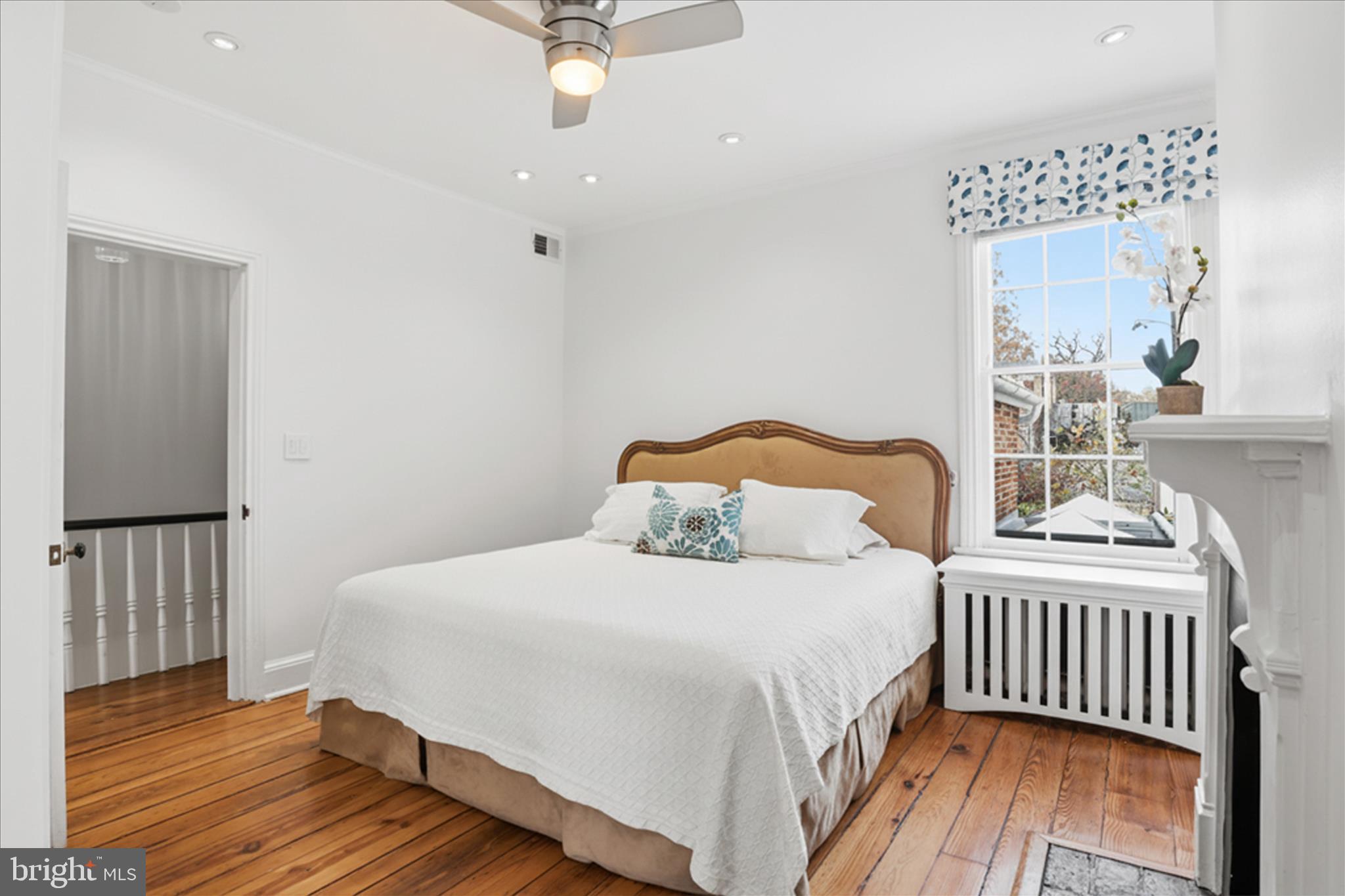 3011 Dumbarton Street Northwest Washington, DC 20007 - Photo 26 of 49 Bedroom 1 with wood burning fireplace