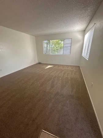 an empty room with windows