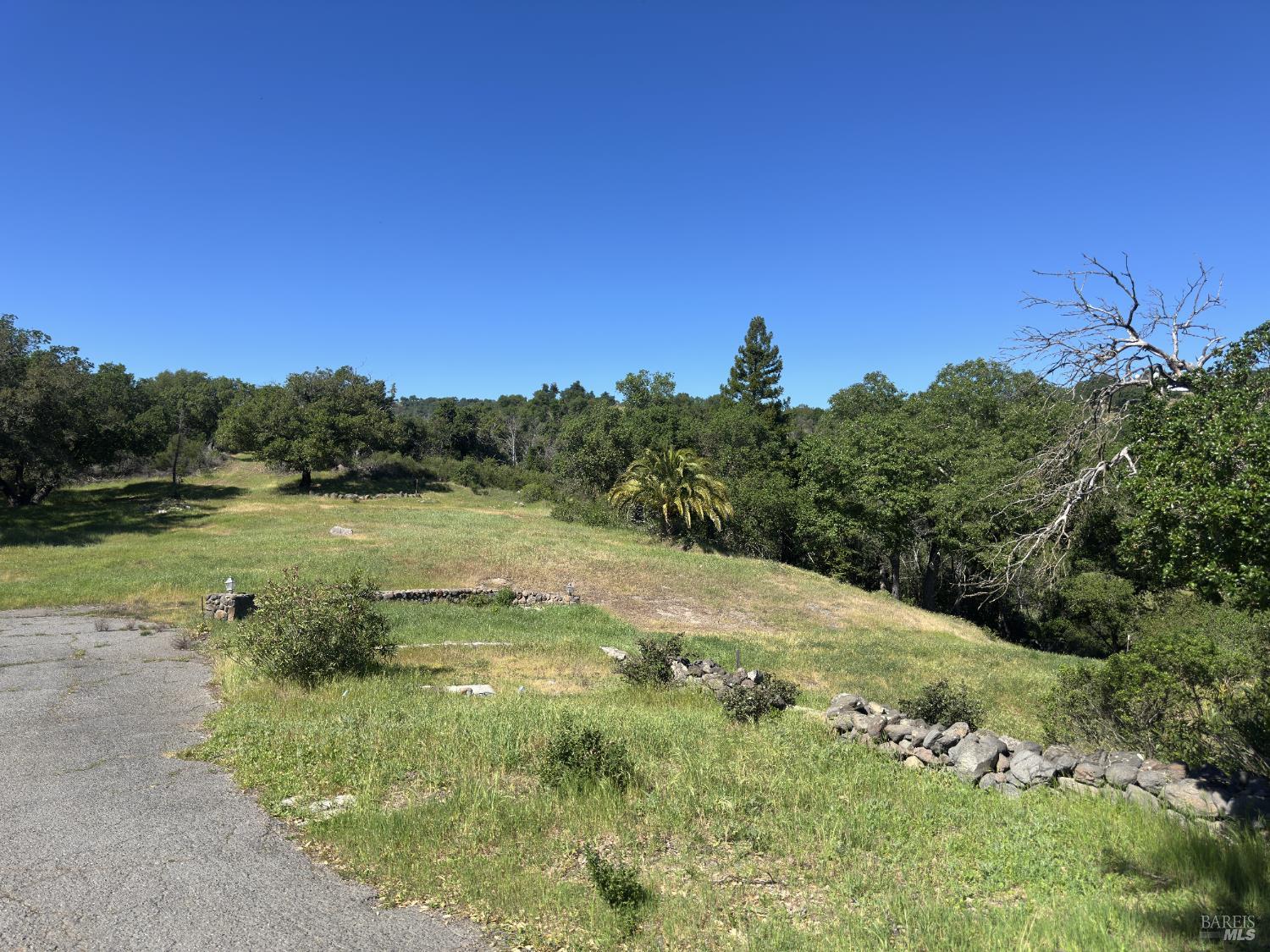 2355 Atlas Peak Road Napa, CA 94558 - Photo 19 of 22 Northern view showing well head and remnants of the 2 br guest house