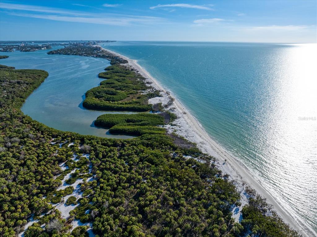 1198 Mandalay Point Road Clearwater, FL 33767 - Photo 38 of 61 a view of a lake with a outdoor space